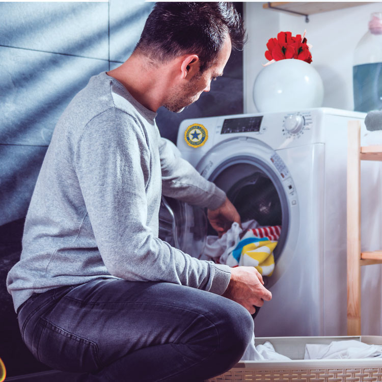 man doing laundry 