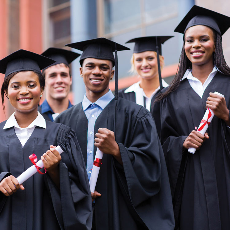 students in cap and gowns