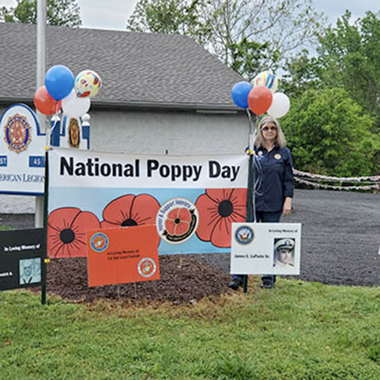 Contactless drive-thru helps distribute poppies and honor veterans during National Poppy Day®